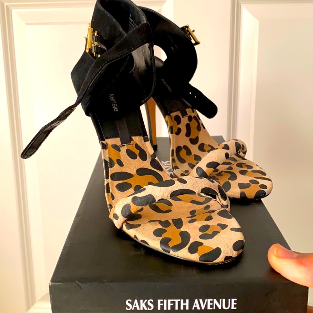 Leopard print heels with black suede accents